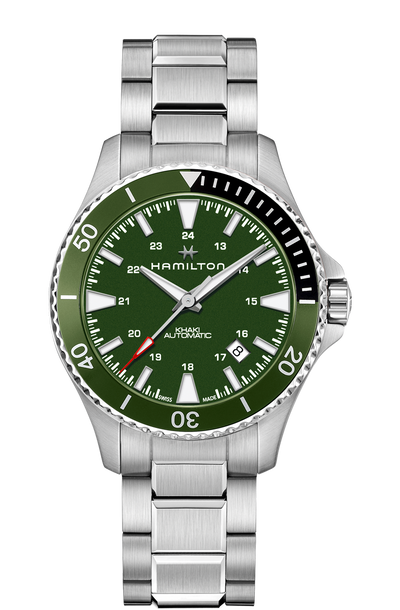wrist watch steel case steel bracelet and green dial 