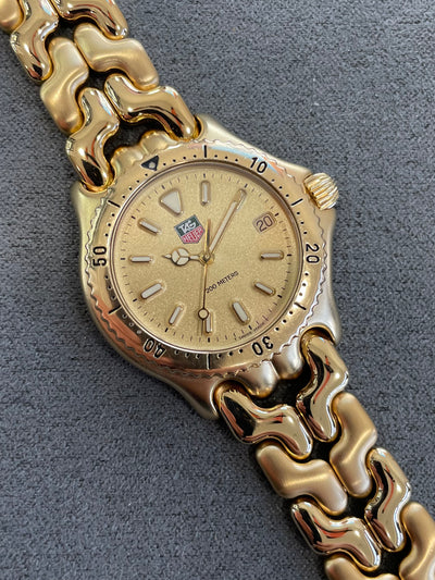 wristwatch gold color case dial and bracelet