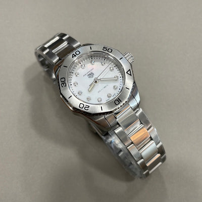 Steel wristwatch on mother of pearl with diamonds dial and steel bracelet 