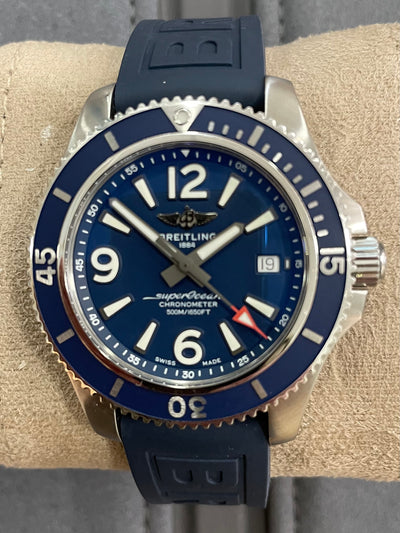 Steel watch on blue dial and Blue Rubber band