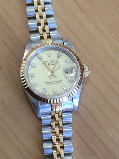 wrist watch two tone bracelet steel and gold champagne color dial with diamonds